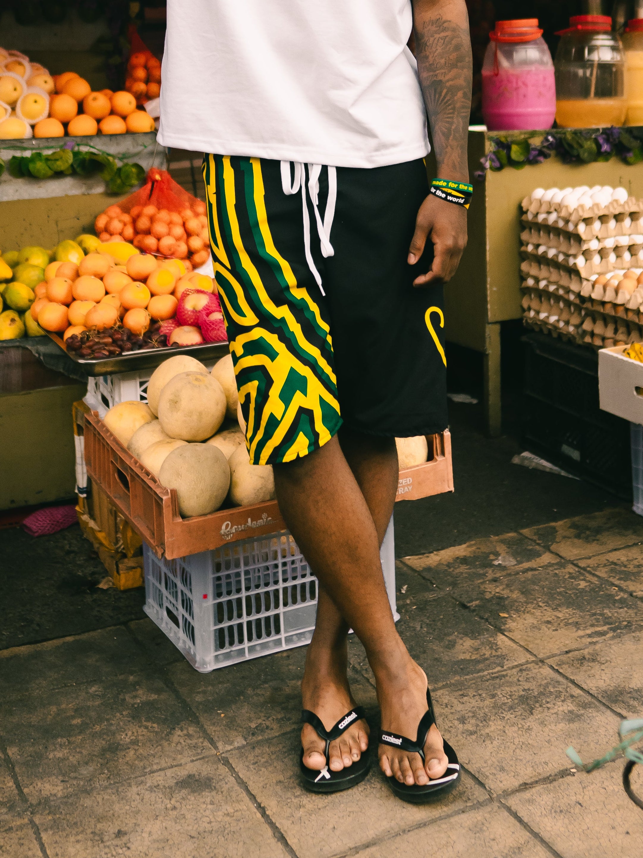 “26 Board Shorts” in Black, Green and White Colorway