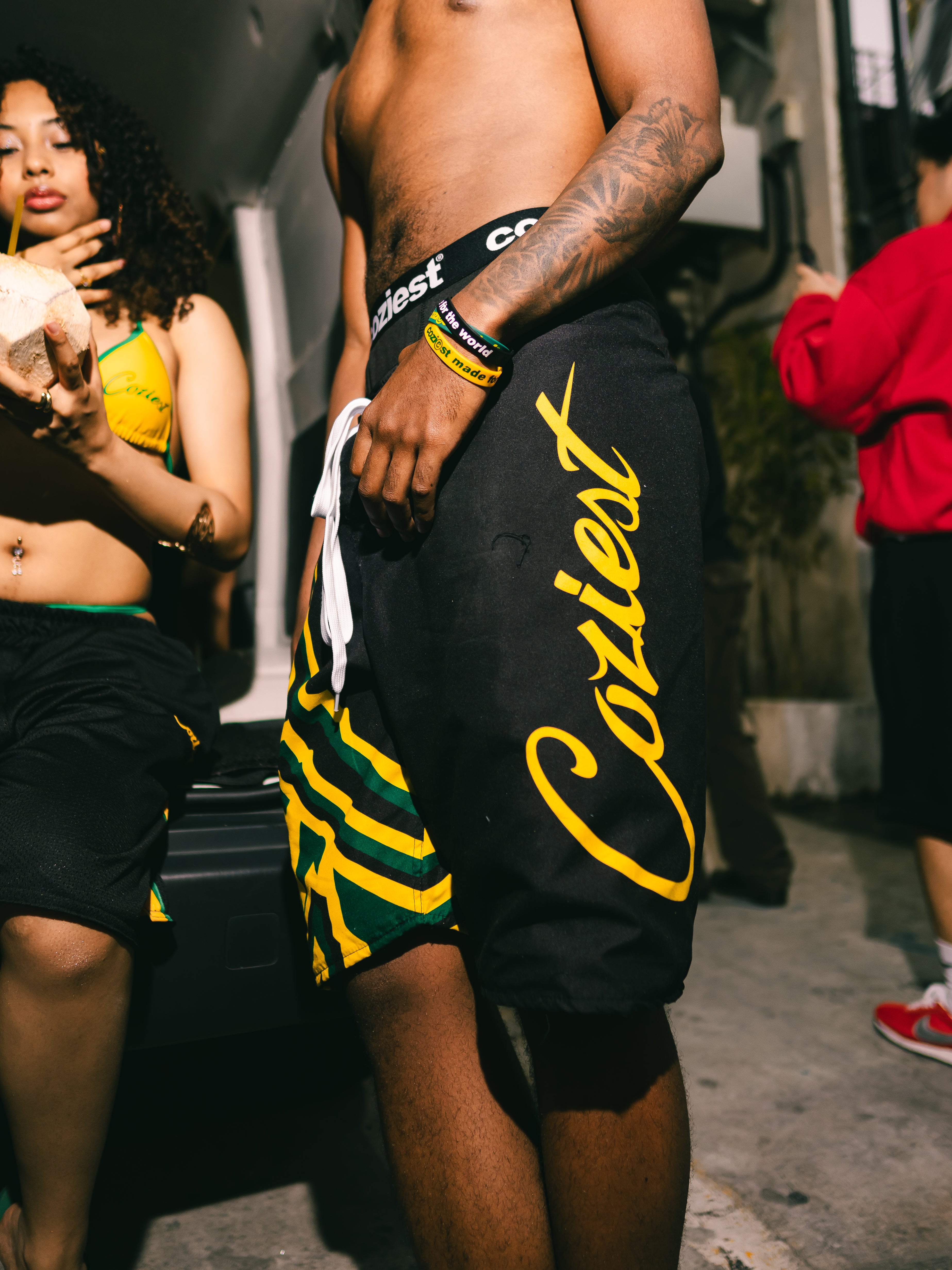 “26 Board Shorts” in Black, Green and White Colorway
