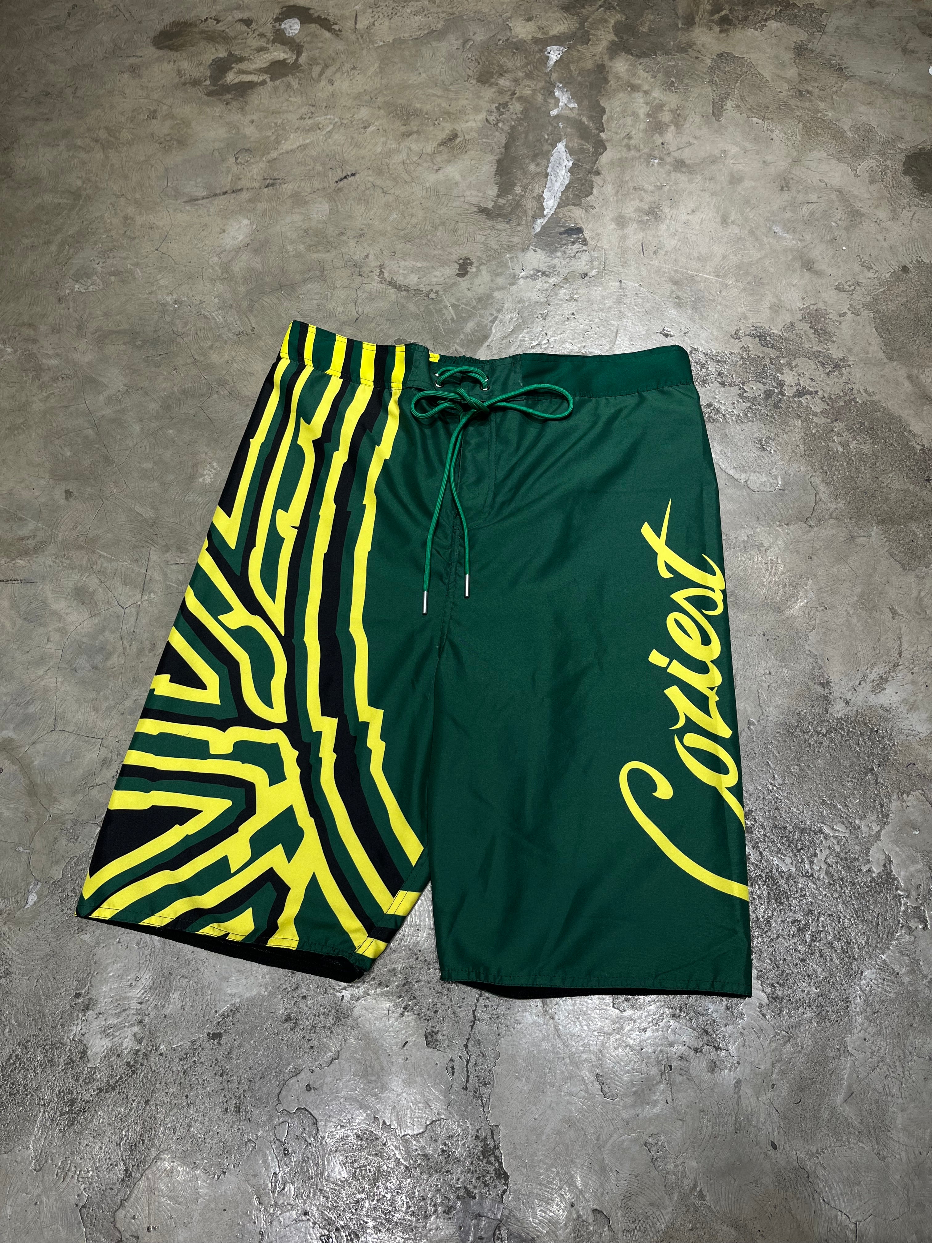 “26 Board Shorts” in Black, Green and White Colorway